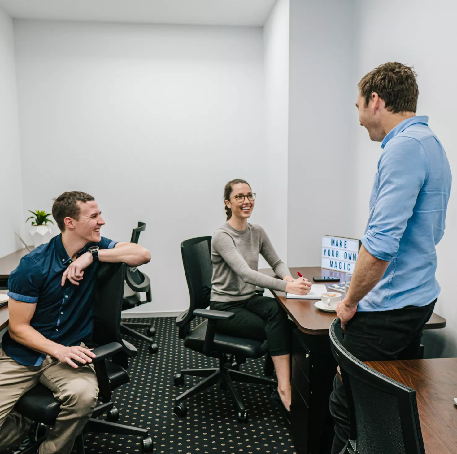 close up on people working in a service office room in Barangaroo, tower 1