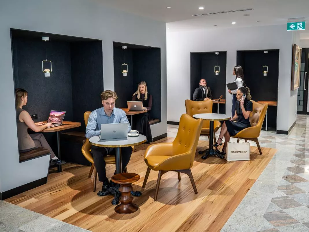 Co-working area of Servcorp Chifley tower housing clients on the Hot desks and co-working booths