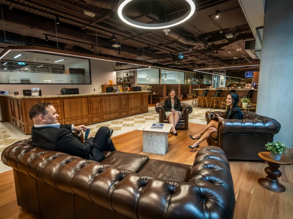 Clients conversing and enjoying the lounge in Servcorp 3 Parramatta Square